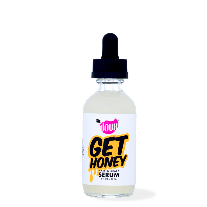 A bottle of The Doux Get Honey Hair & Scalp Serum with a dropper cap.