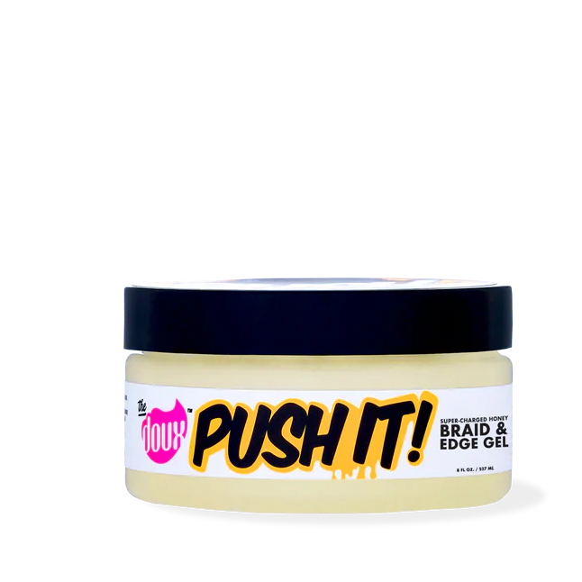 A container of The Doux Push It! Honey Braid & Edge Gel with a yellow label, black lid, and pink text.